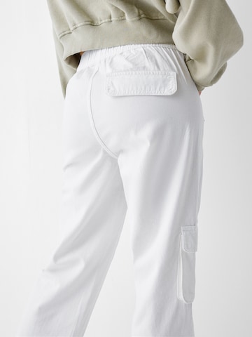 Bershka Loose fit Cargo trousers in White