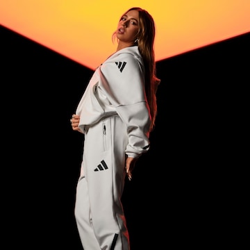 ADIDAS SPORTSWEAR Конический (Tapered) Спортивные штаны 'W Z.N.E. PT' в Белый