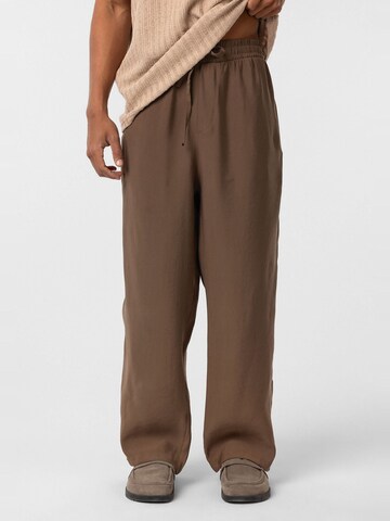 Dandalo Baggy Trousers in Brown: front