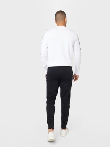 Tapered Pantaloni de la Michael Kors pe negru