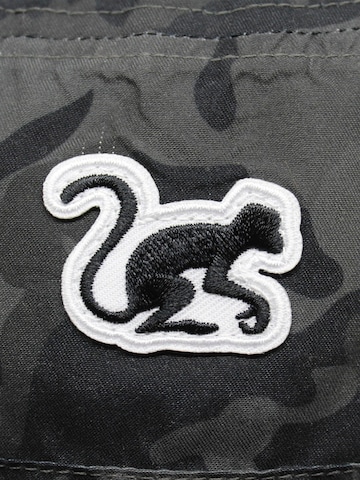 Chapeaux Surf Monkey en mélange de couleurs