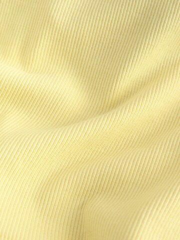 Next - Top en amarillo