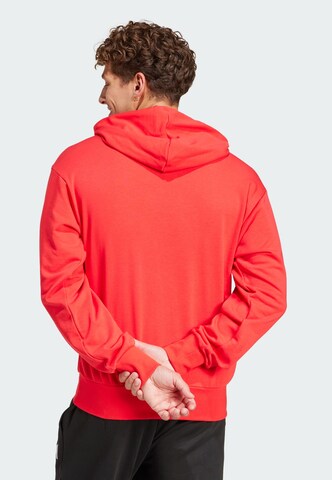 ADIDAS SPORTSWEAR Sportsweatshirt 'Essentials Feelcozy' in Rot