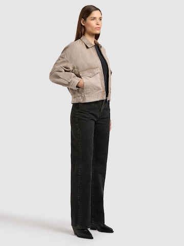 khujo Tussenjas 'Nelina' in Bruin