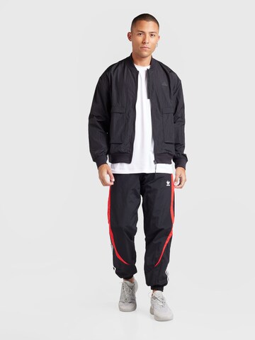ADIDAS ORIGINALS Loose fit Trousers 'Archive' in Black