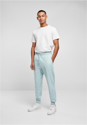 Tapered Pantaloni di Urban Classics in blu