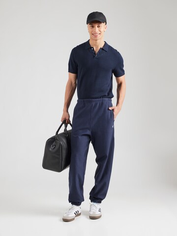 Calvin Klein Jeans Дънки Tapered Leg Панталон в синьо