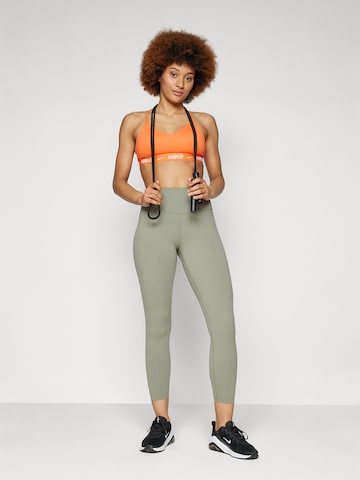 NIKE Μπουστάκι Αθλητικό σουτιέν 'INDY' σε πορτοκαλί