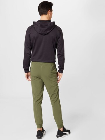 PUMA Normalny krój Spodnie sportowe w kolorze zielony