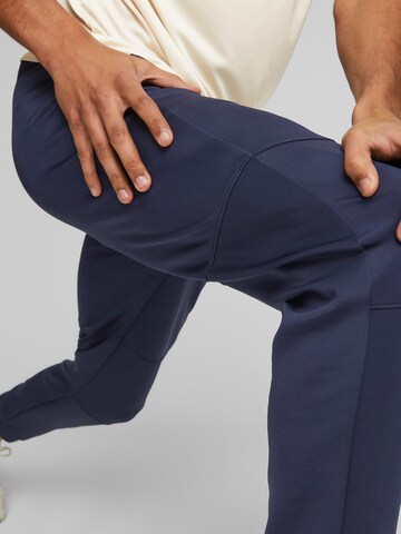 Effilé Pantalon de sport PUMA en bleu