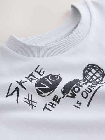 Next - Camiseta en blanco