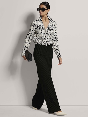 MADELEINE Bluse in Schwarz