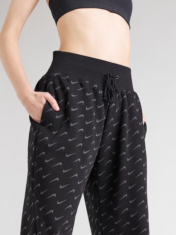 Tapered Pantaloni 'PHOENIX FLEECE' de la Nike Sportswear pe negru