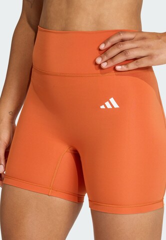 ADIDAS PERFORMANCE Skinny Sportbroek 'Optime Essentials' in Oranje