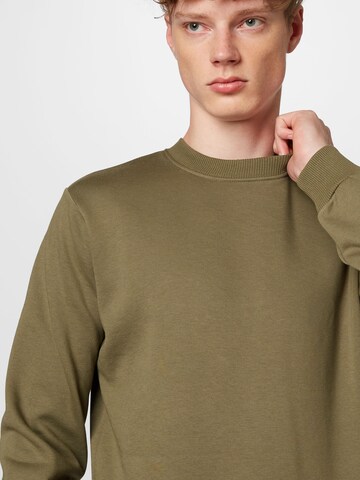 ABOUT YOU Sweatshirt 'Curt' in Groen