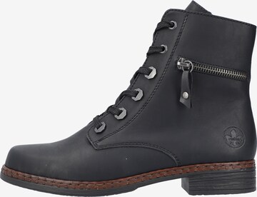 Rieker - Botines con cordones en negro