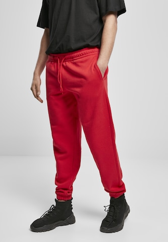 Tapered Pantaloni di Urban Classics in rosso