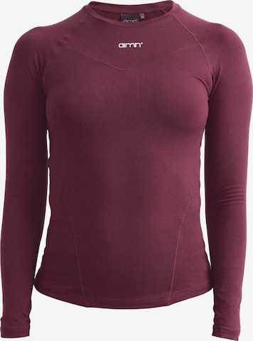 T-shirt fonctionnel Aim'n en rouge : devant