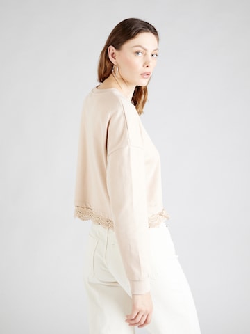 ABOUT YOU Sweatshirt 'Georgeia' (GOTS) in Beige