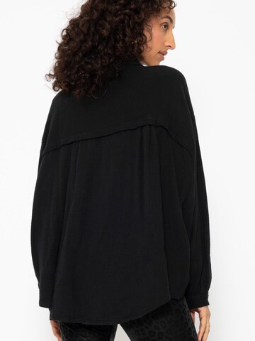 SASSYCLASSY Bluse 'kürzere Variante' in Schwarz