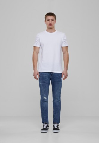 Skinny Jeans di Karl Kani in blu