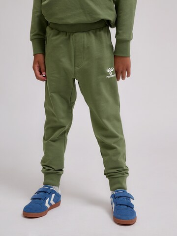Hummel Tapered Sports trousers in Green: front