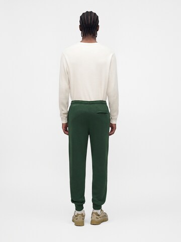 Nike Sportswear Tapered Nadrág 'CLUB' - zöld
