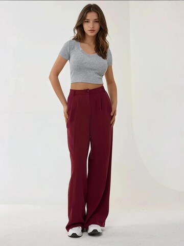 Wide leg Pantaloni con piega frontale di Hiccup in rosso