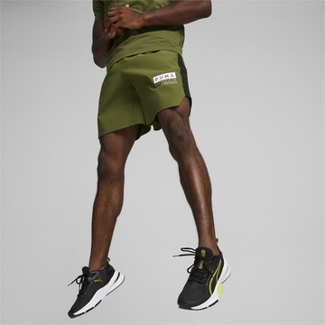 Regular Pantaloni sport 'Fuse 7' de la PUMA pe verde: față