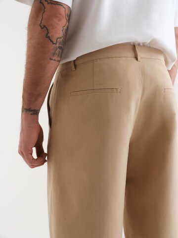 ABOUT YOU x Kevin Trapp Loose fit Trousers 'Jesper' in Beige
