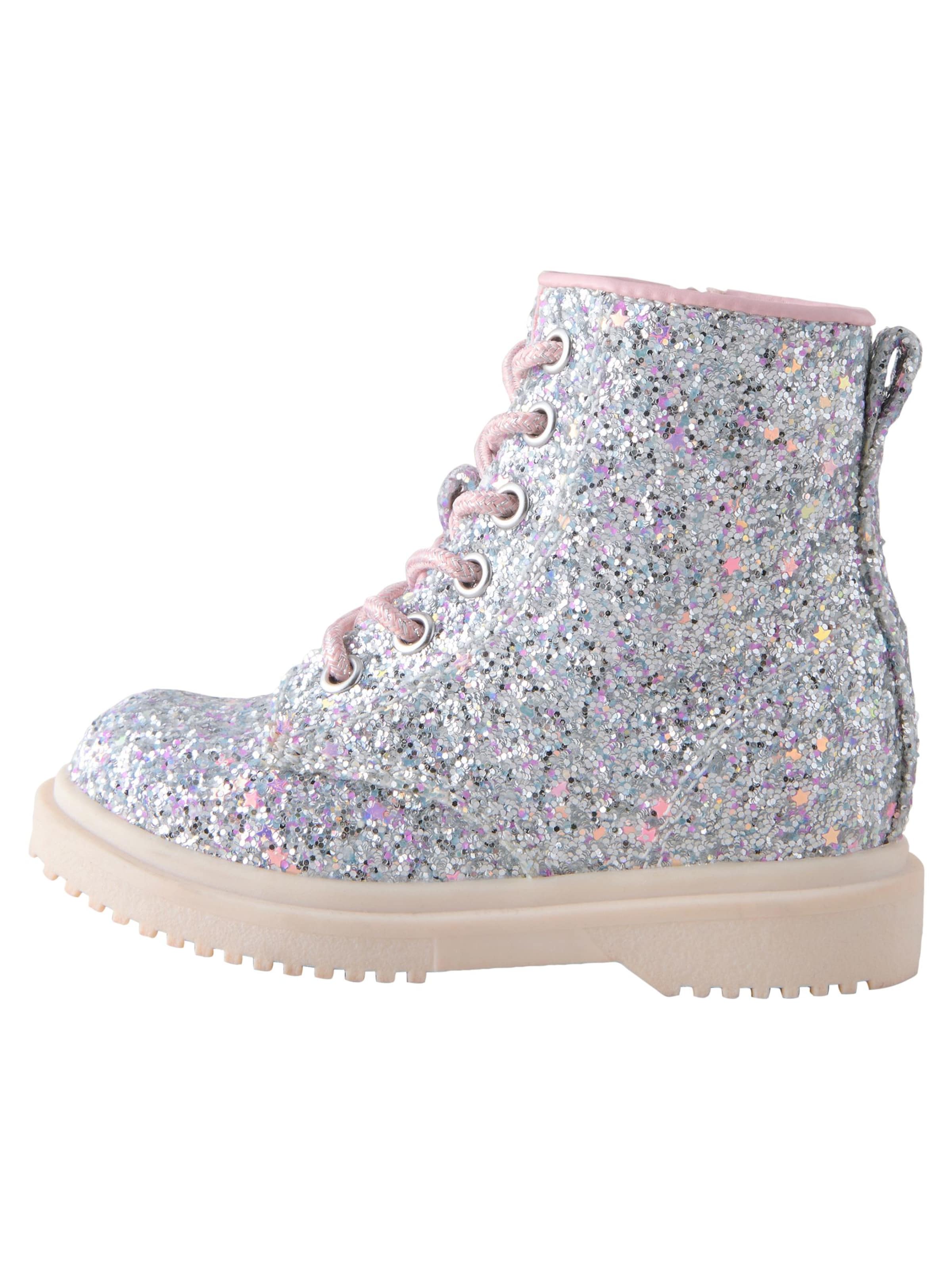 sudrabs Next Zābaki: no priekšpuses