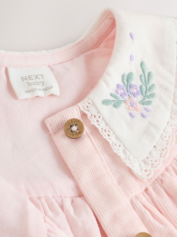 Set Next en rose