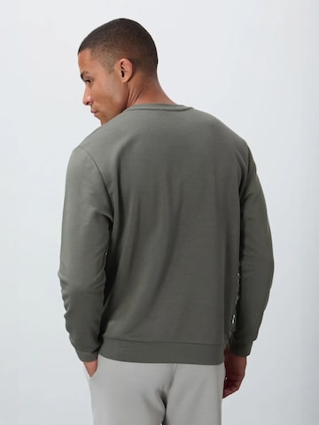 Sweat-shirt Tommy Life en vert