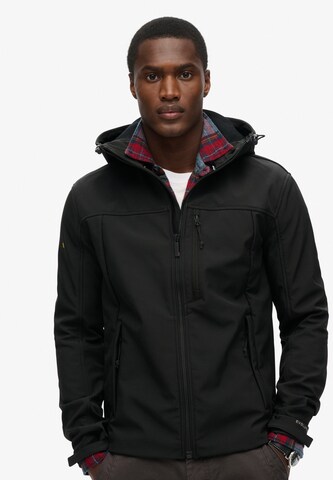 Superdry Between-season jacket 'Trekker' in Black: front