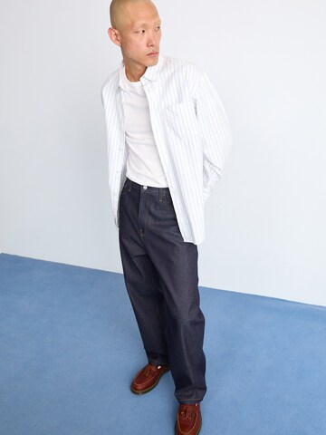 Carhartt WIP Lużny krój Jeansy 'Landon' w kolorze niebieski