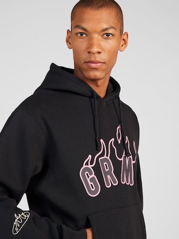 GrimeySweater majica 'MELTED STONE' - crna boja