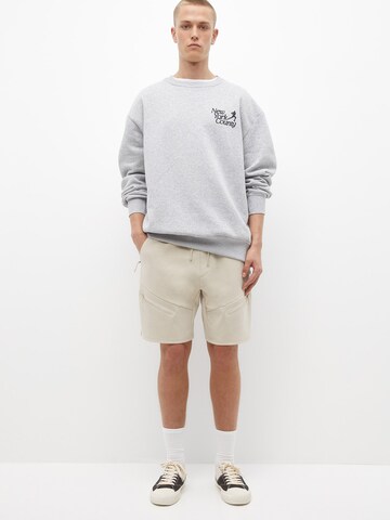 Pull&Bear regular Cargobukser i beige: forside