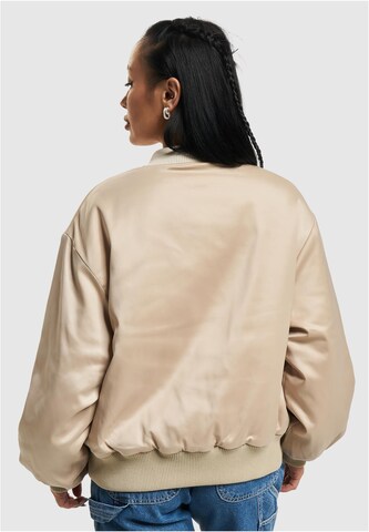 Veste mi-saison Karl Kani en beige