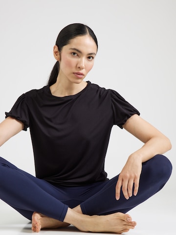 CURARE Yogawear Performance shirt in Black: front