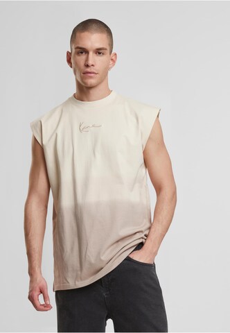 T-Shirt Karl Kani en marron : devant