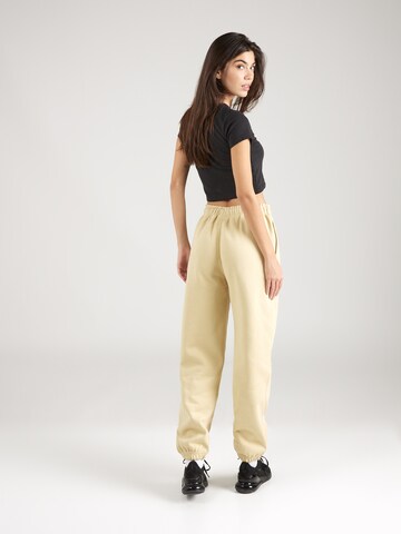 Effilé Pantalon 'Lab' Nike Sportswear en jaune
