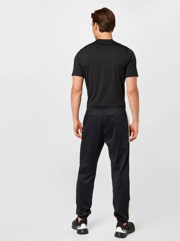 Tapered Pantaloni 'Traun' di FILA in nero