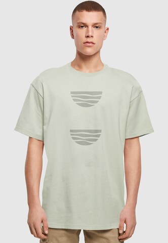 Merchcode T-Shirt 'Abstract Waves' in Grün: Vorderseite