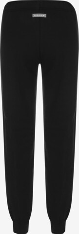 Nike Sportswear - Tapered Calças 'Air' em preto