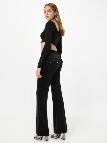 Flared Pantaloni 'LAYLA' di Juicy Couture in nero