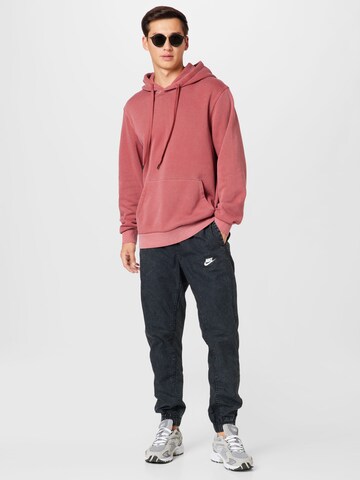 Nike Sportswear Дънки Tapered Leg Панталон в черно