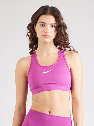 NIKE Bygelfri Sportbehå 'SWOOSH' i rosa: framsida
