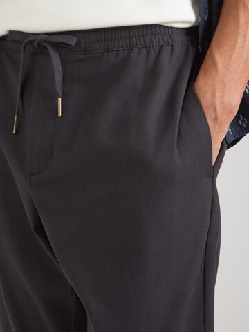 SCOTCH & SODA Tapered Trousers in Black