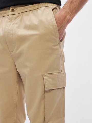 Calvin Klein Jeans Tapered Παντελόνι cargo σε καφέ