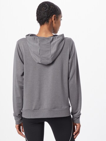 UNDER ARMOUR Sports sweatshirt 'Rival' in Grey